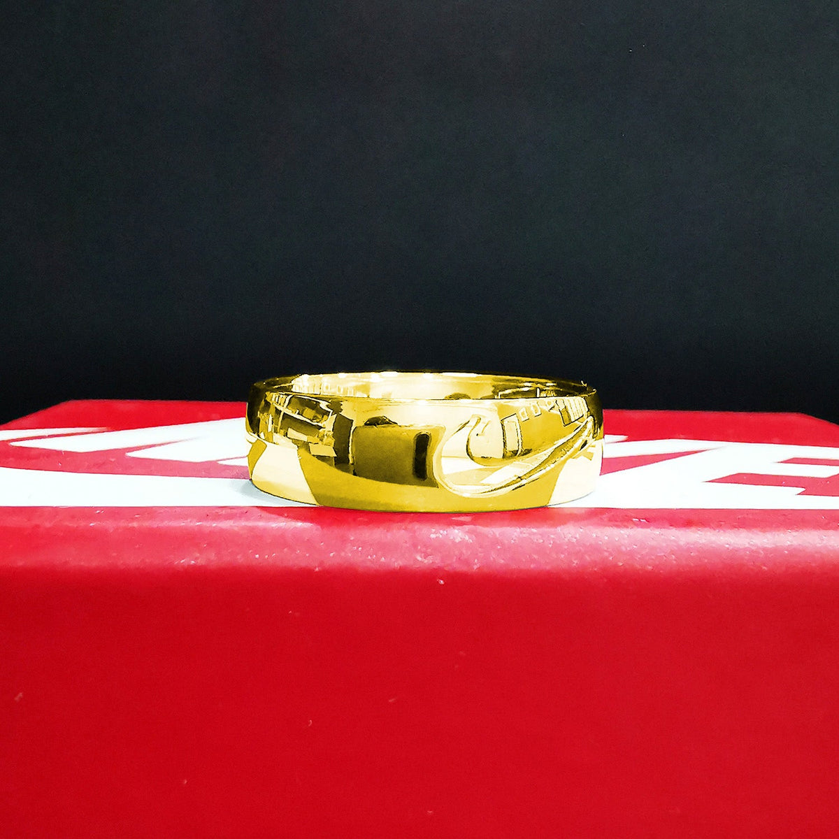 Bague Nike "Queen's Gold"